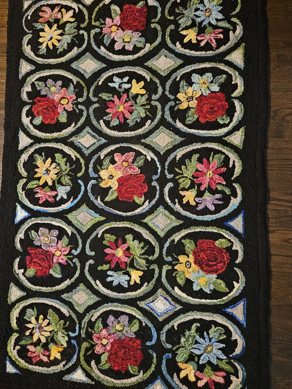 Hand-hooked Floral Rug in Black with Multicolor Flowers